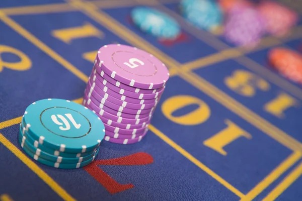 Baccarat layout with banker and player positions